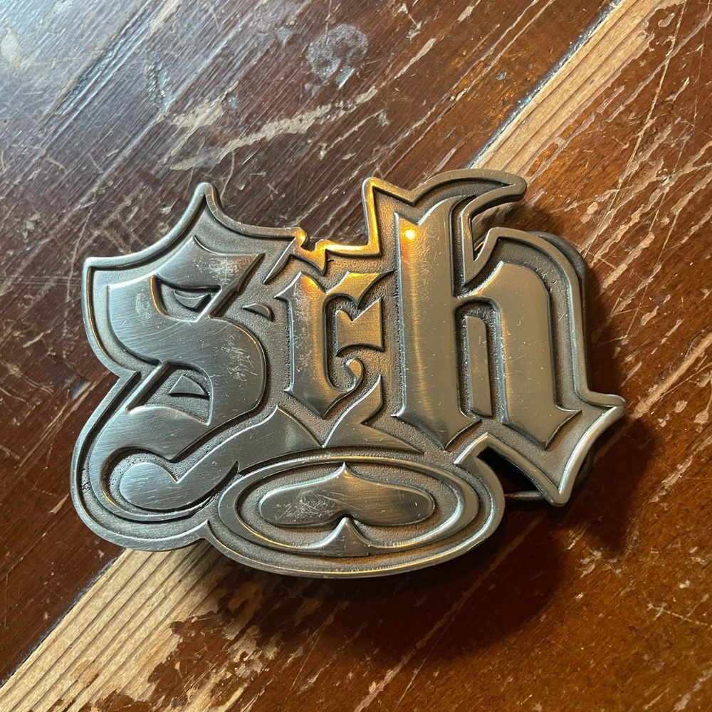 SRH Supporting Radical Habits pewter belt buckle skulls on back. Spade on front.